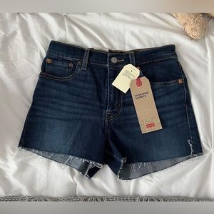 Levi’s, dark blue denim shorts. Comfy and flattering!